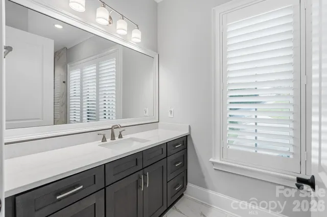 a bathroom with a shower and toilet