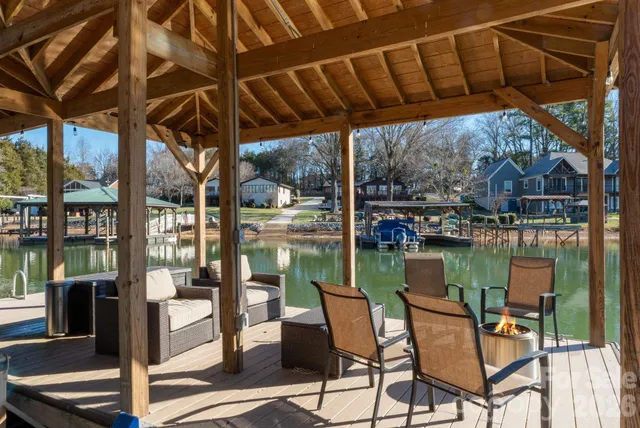 an aerial view of a house with outdoor space