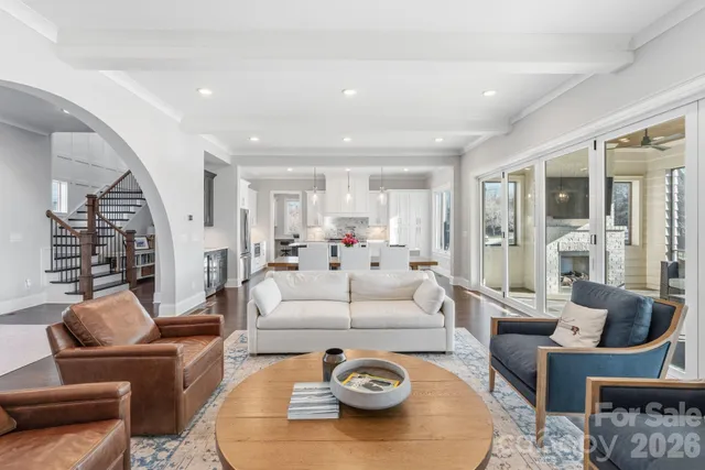 a living room with furniture and a table