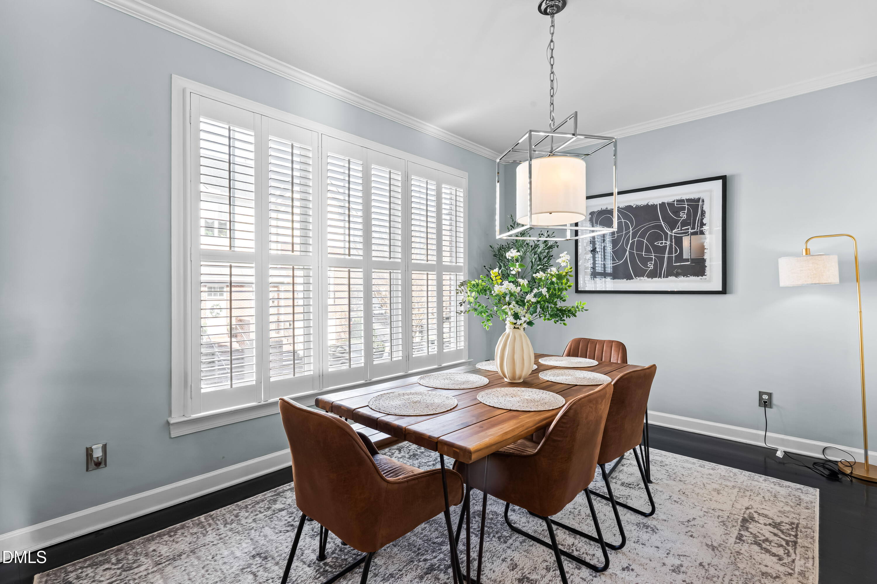 6104 Shandwick Court Raleigh, NC 27609 - Photo 7 of 40 a dining room with furniture window and wooden floor