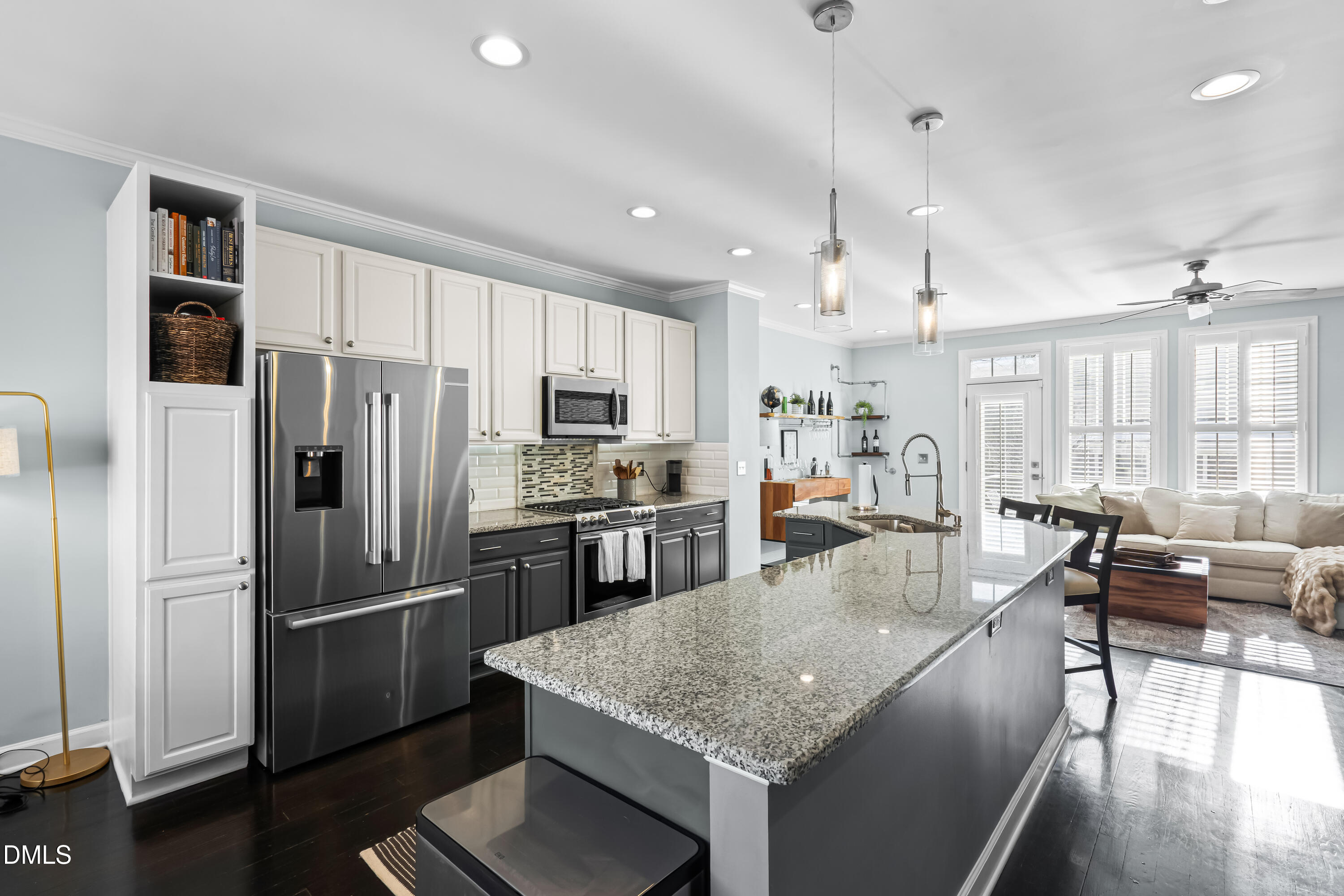 6104 Shandwick Court Raleigh, NC 27609 - Photo 8 of 40 a kitchen with stainless steel appliances granite countertop a refrigerator a stove and a sink