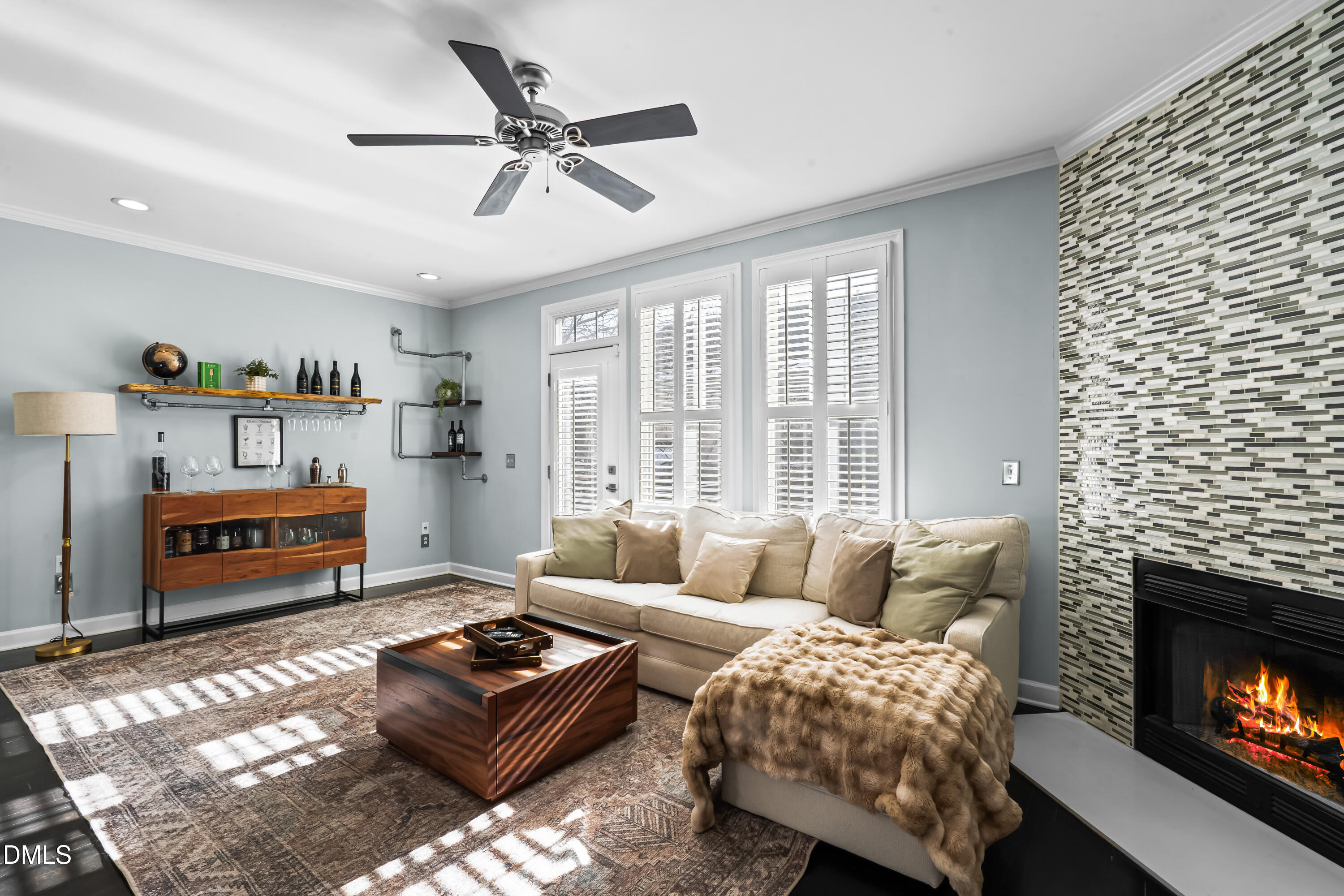 6104 Shandwick Court Raleigh, NC 27609 - Photo 16 of 40 a living room with furniture and a fireplace