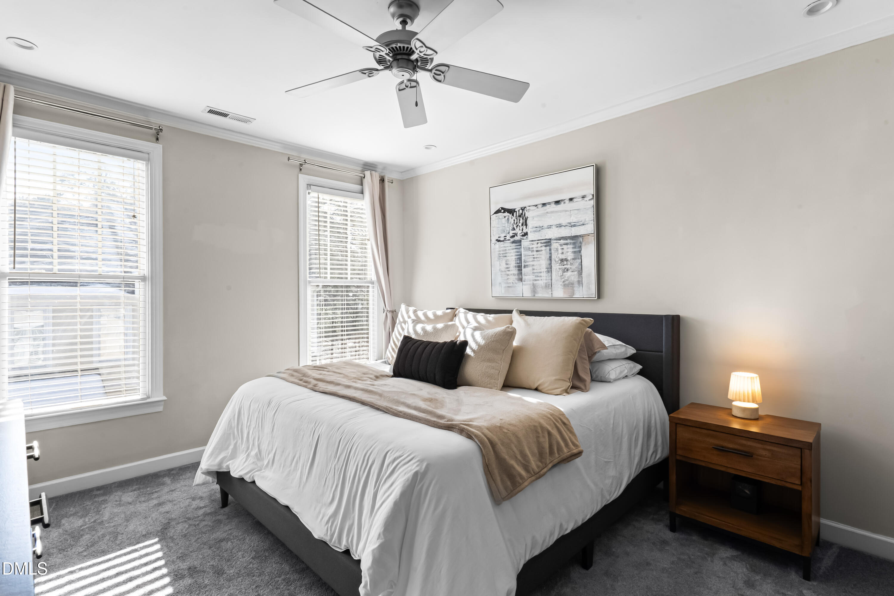 6104 Shandwick Court Raleigh, NC 27609 - Photo 19 of 40 a bedroom with a bed and window