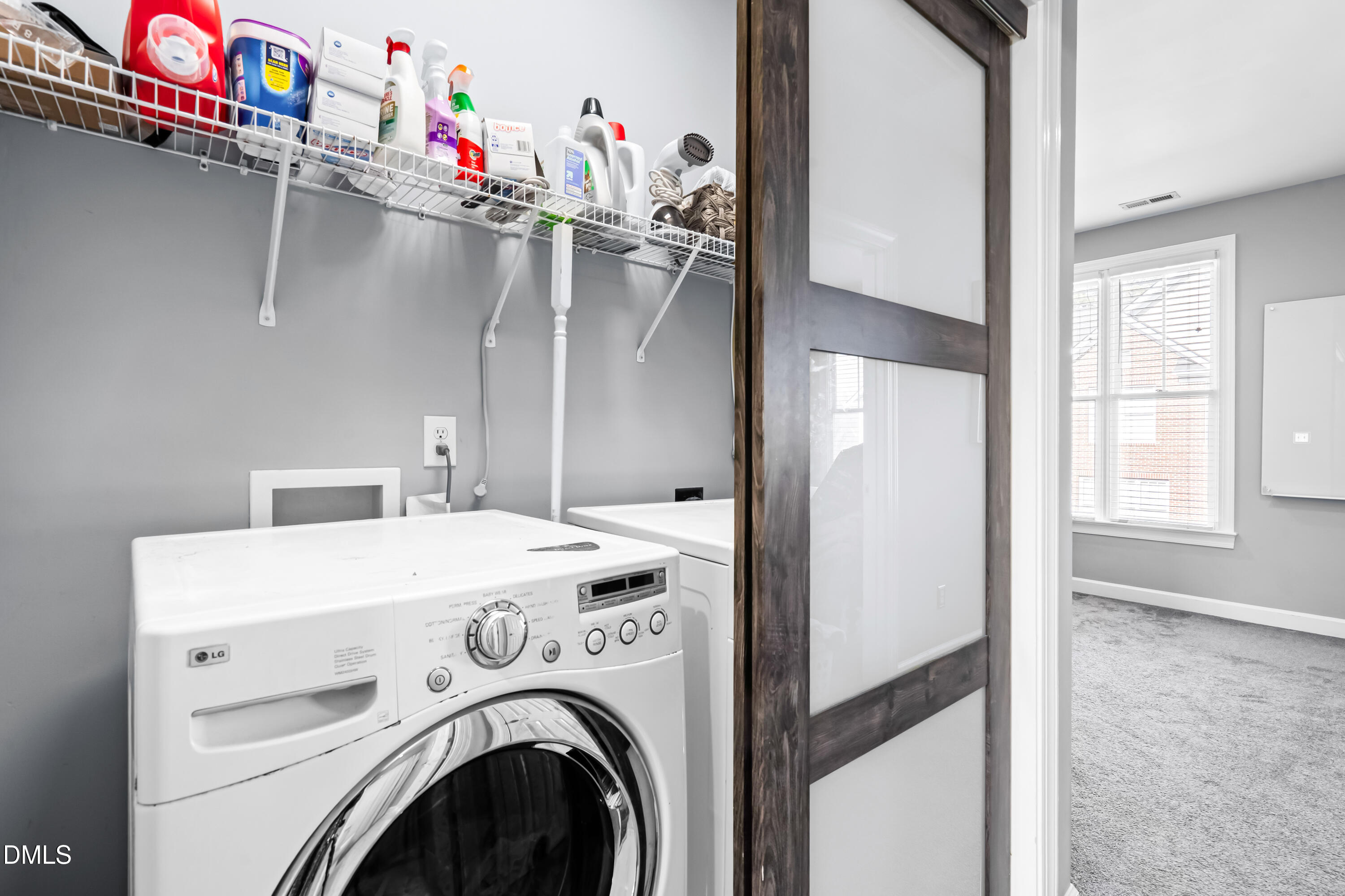 6104 Shandwick Court Raleigh, NC 27609 - Photo 32 of 40 a utility room with dryer and washer