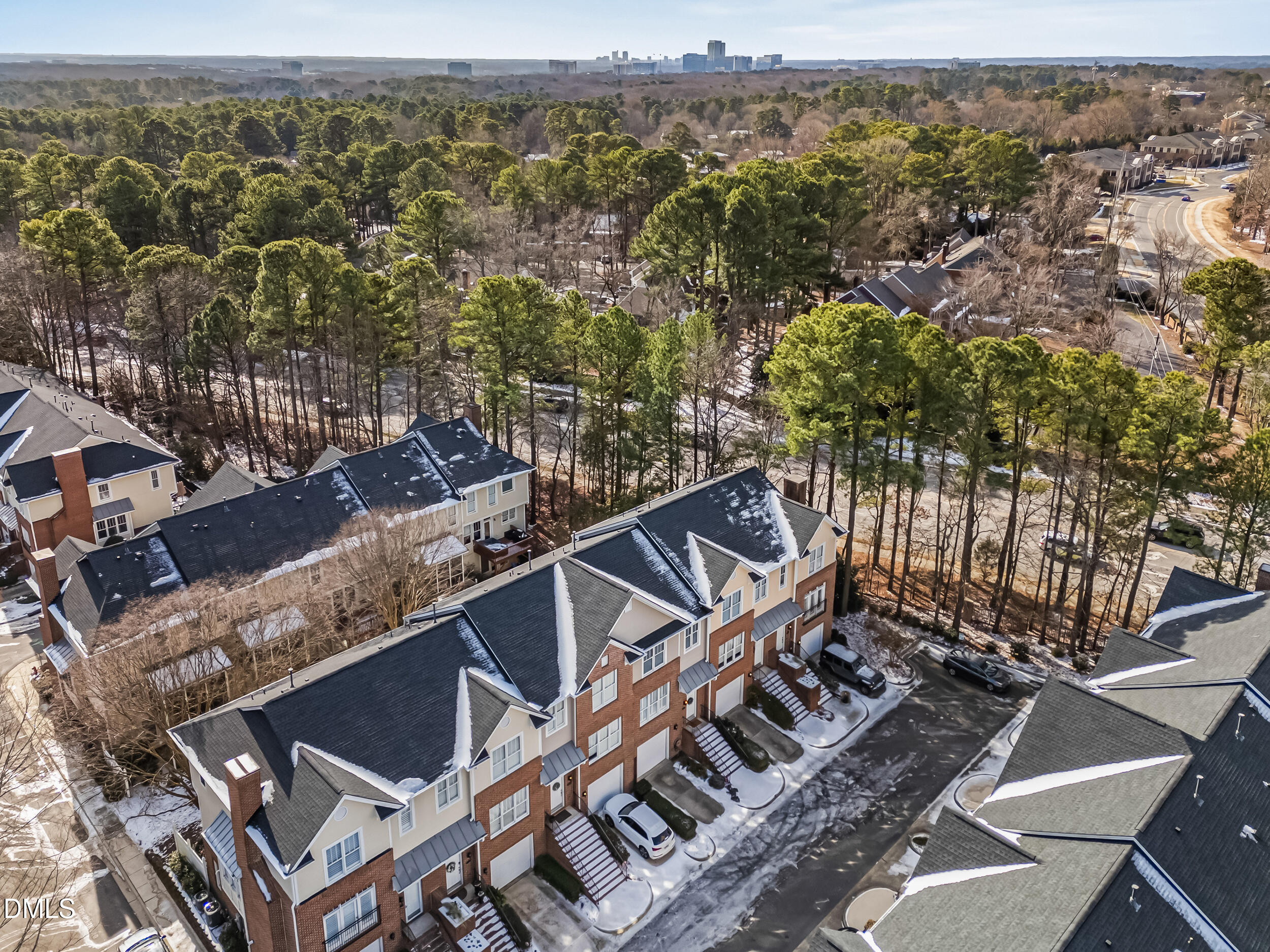6104 Shandwick Court Raleigh, NC 27609 - Photo 35 of 40 an aerial view of a house with a mountain