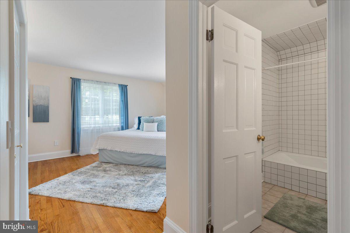 19 Rolling Hill Road Skillman, NJ 08558 - Photo 19 of 69 a bathroom with a granite countertop sink and a mirror