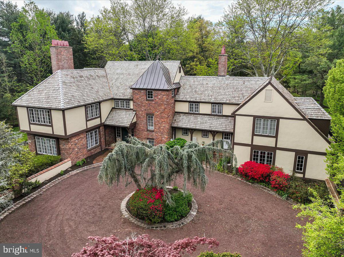 19 Rolling Hill Road Skillman, NJ 08558 - Photo 2 of 69 an aerial view of a house roof deck and trees
