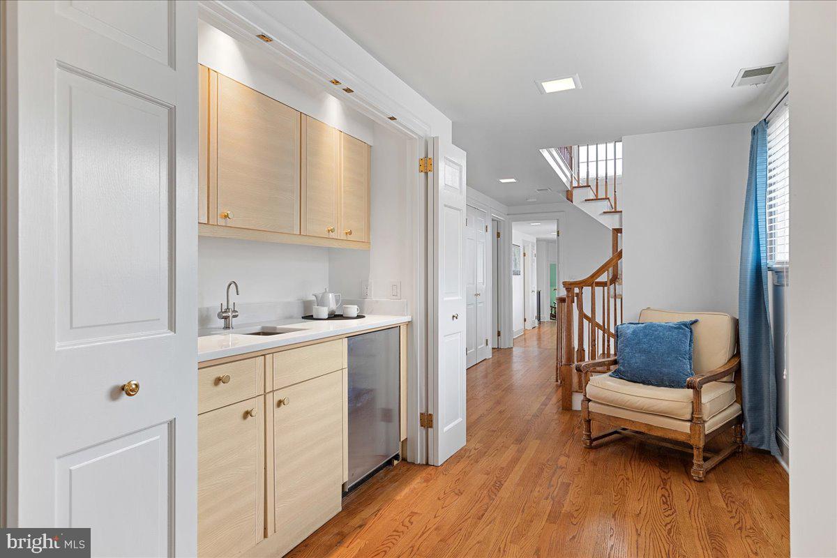 19 Rolling Hill Road Skillman, NJ 08558 - Photo 22 of 69 a living room with furniture and a wooden floor