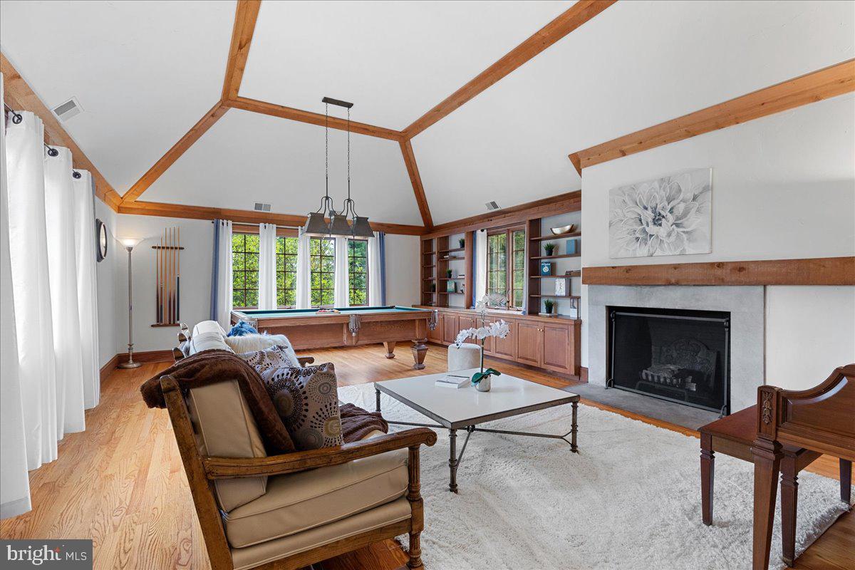 19 Rolling Hill Road Skillman, NJ 08558 - Photo 23 of 69 a living room with furniture and a fireplace