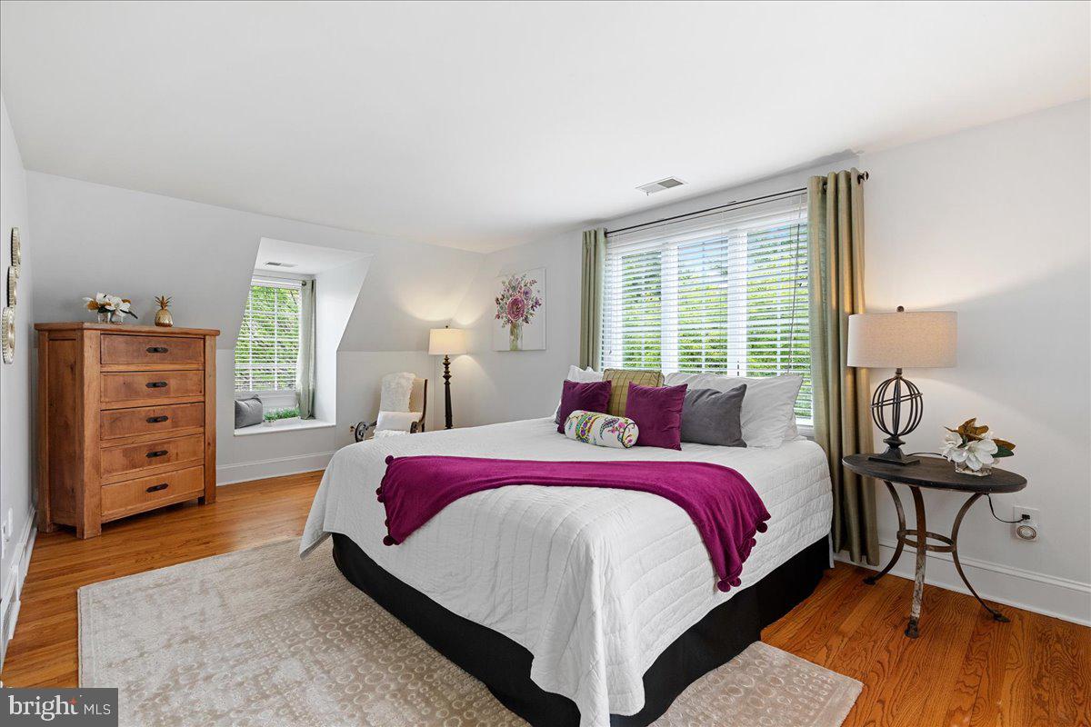 19 Rolling Hill Road Skillman, NJ 08558 - Photo 33 of 69 a bed room with a bed and a tv