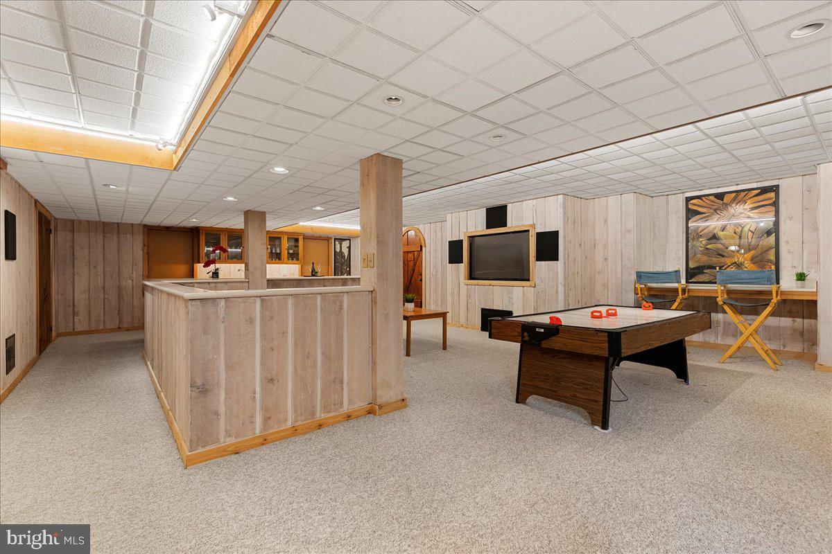 19 Rolling Hill Road Skillman, NJ 08558 - Photo 36 of 69 a living room with furniture pool table and flat screen tv