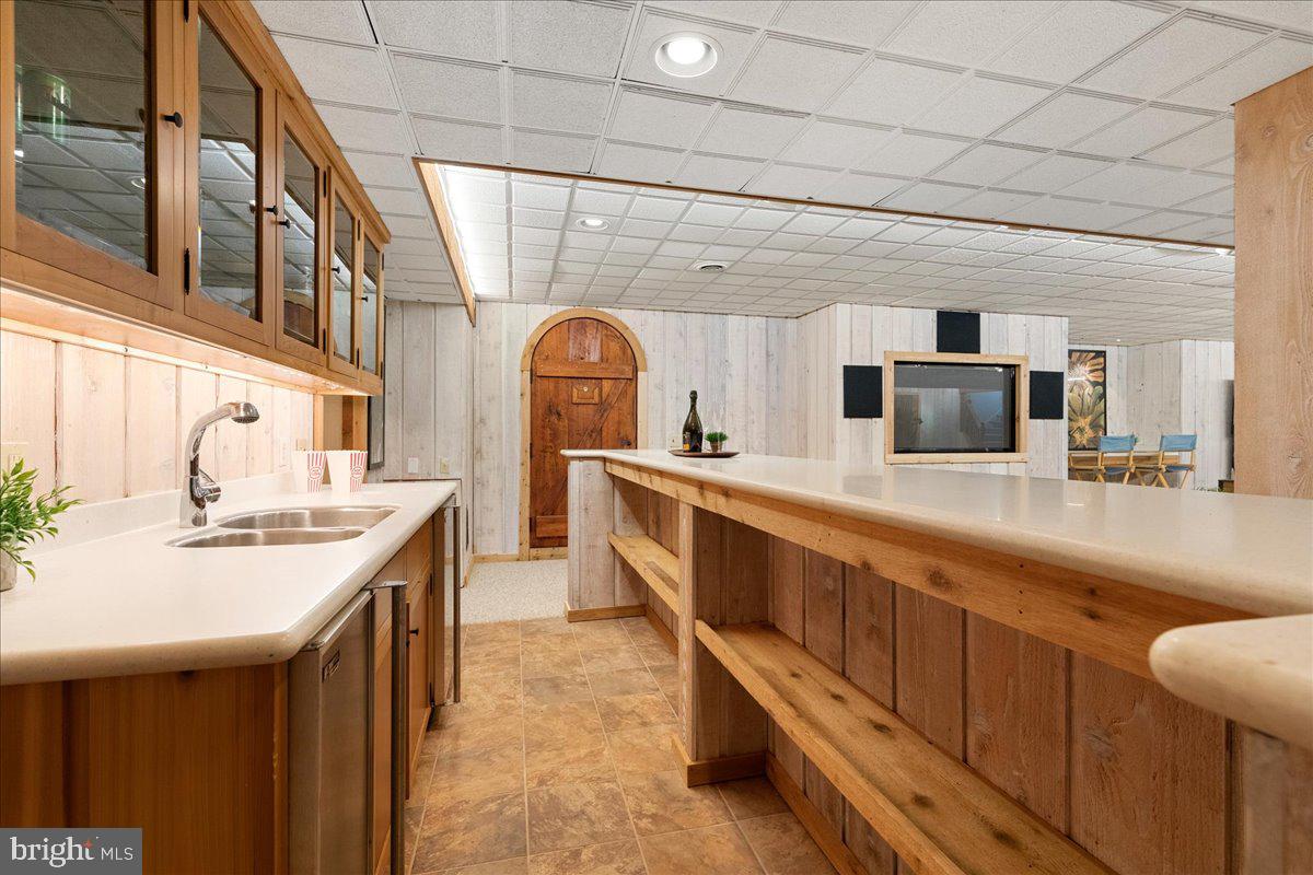 19 Rolling Hill Road Skillman, NJ 08558 - Photo 38 of 69 a large kitchen with stainless steel appliances a sink and cabinets