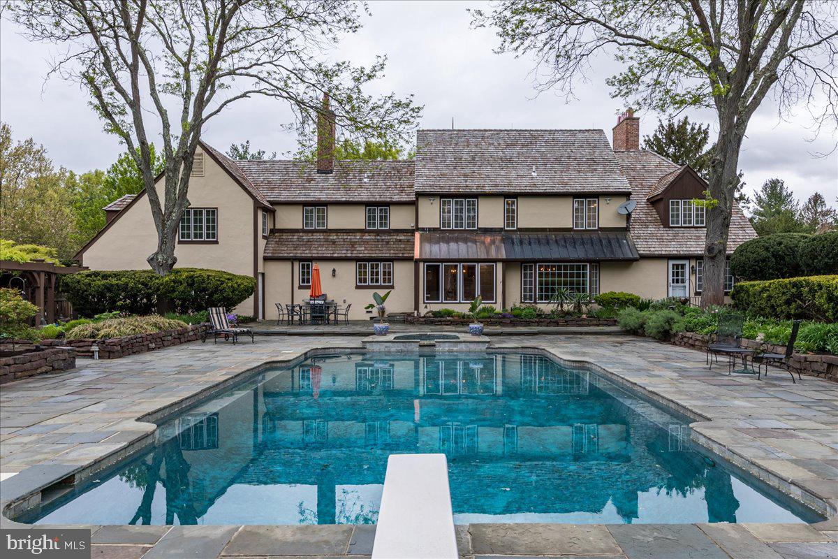 19 Rolling Hill Road Skillman, NJ 08558 - Photo 45 of 69 a view of a house with pool and chairs