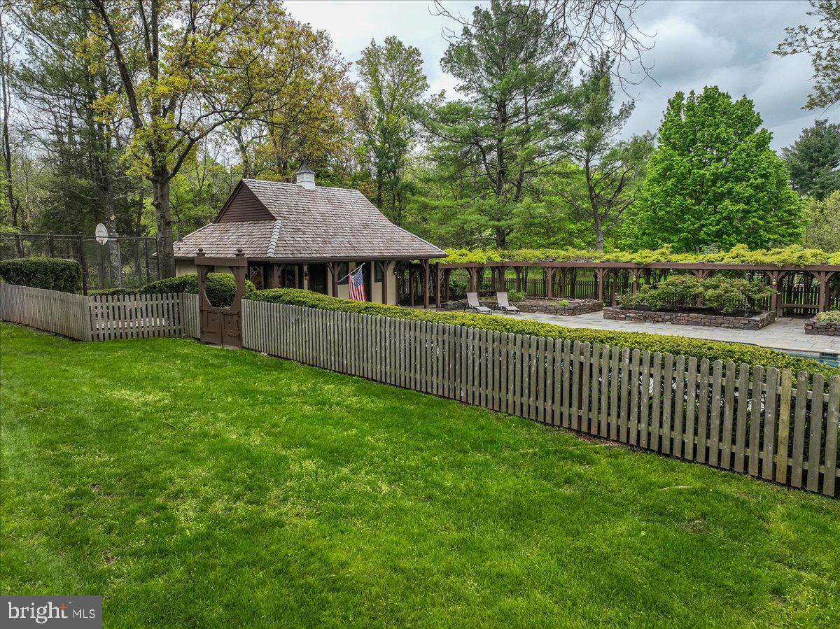 19 Rolling Hill Road Skillman, NJ 08558 - Photo 61 of 69 a view of a house with a backyard and a garden