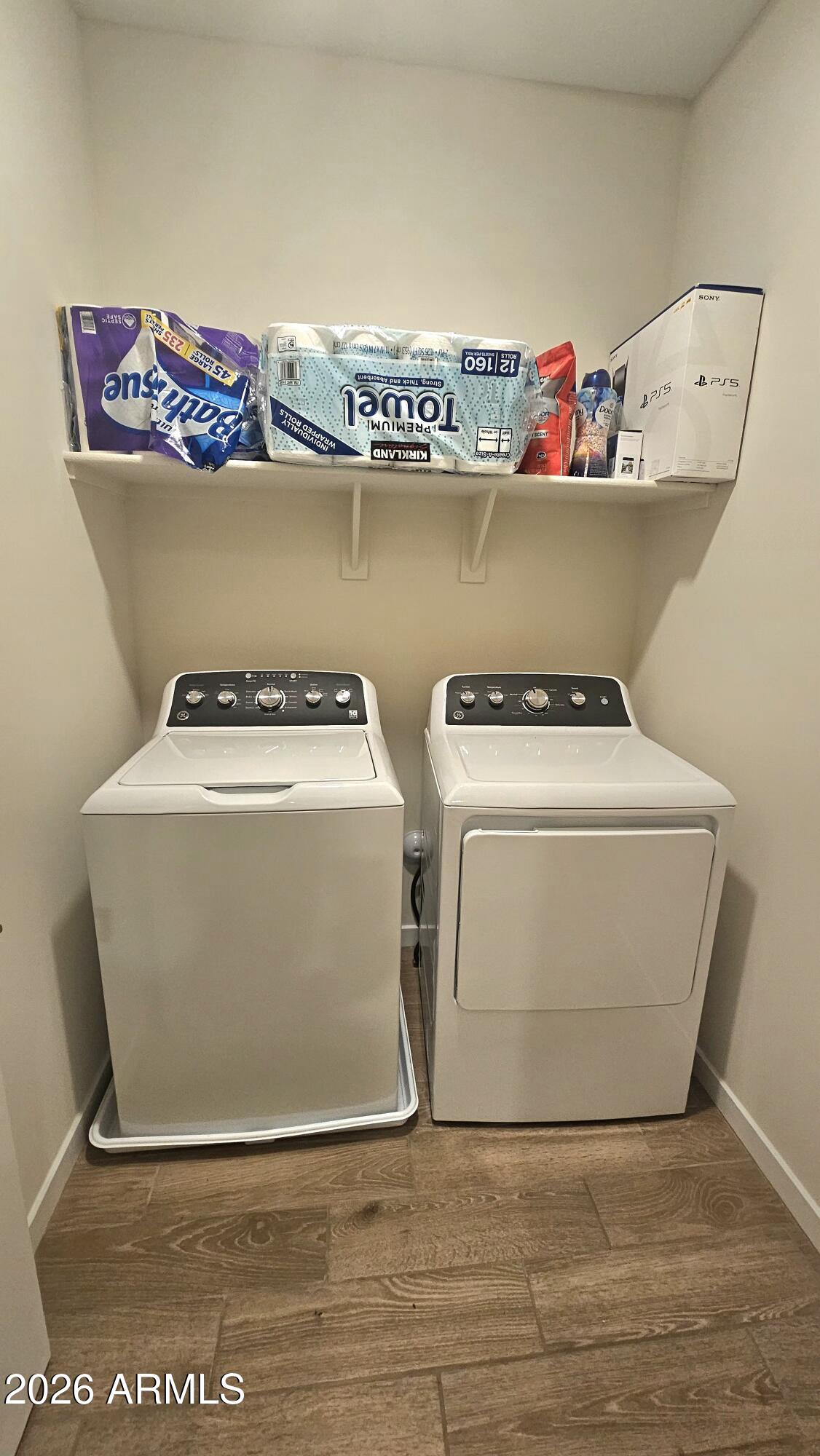 2818 West Red Fox Road Phoenix, AZ 85085 - Photo 10 of 19 a utility room with washer and dryer