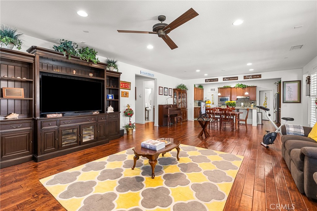 1575 North Grove Street Redlands, CA 92374 - Photo 15 of 45 a living room with furniture and a flat screen tv