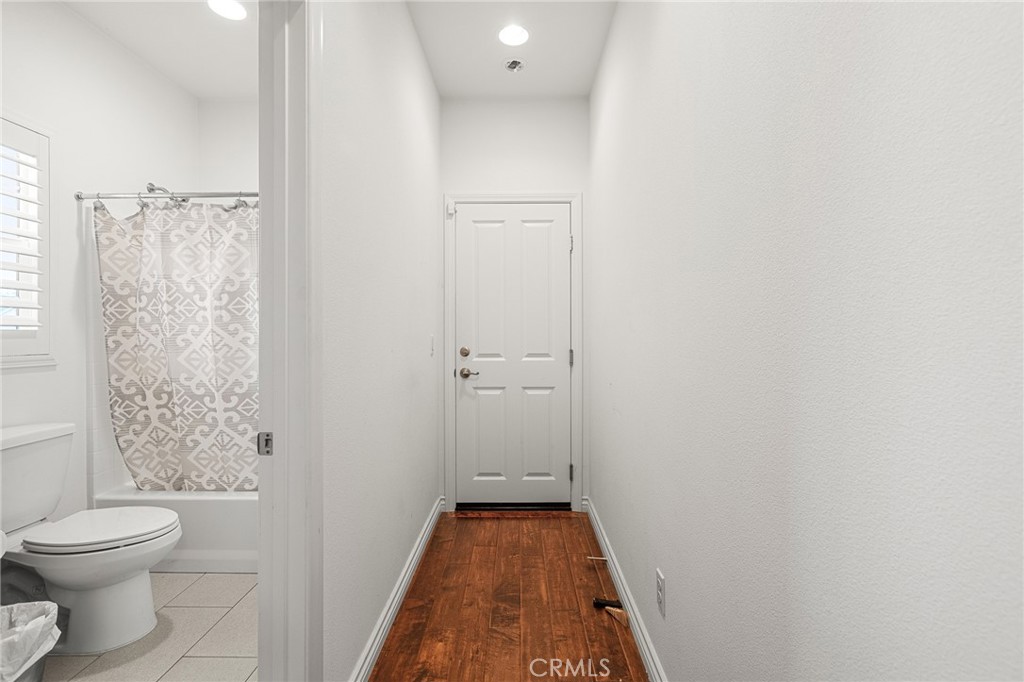 1575 North Grove Street Redlands, CA 92374 - Photo 26 of 45 a bathroom with a toilet and a shower