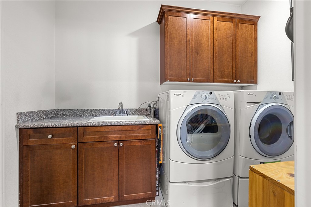 1575 North Grove Street Redlands, CA 92374 - Photo 31 of 45 a utility room with dryer and washer