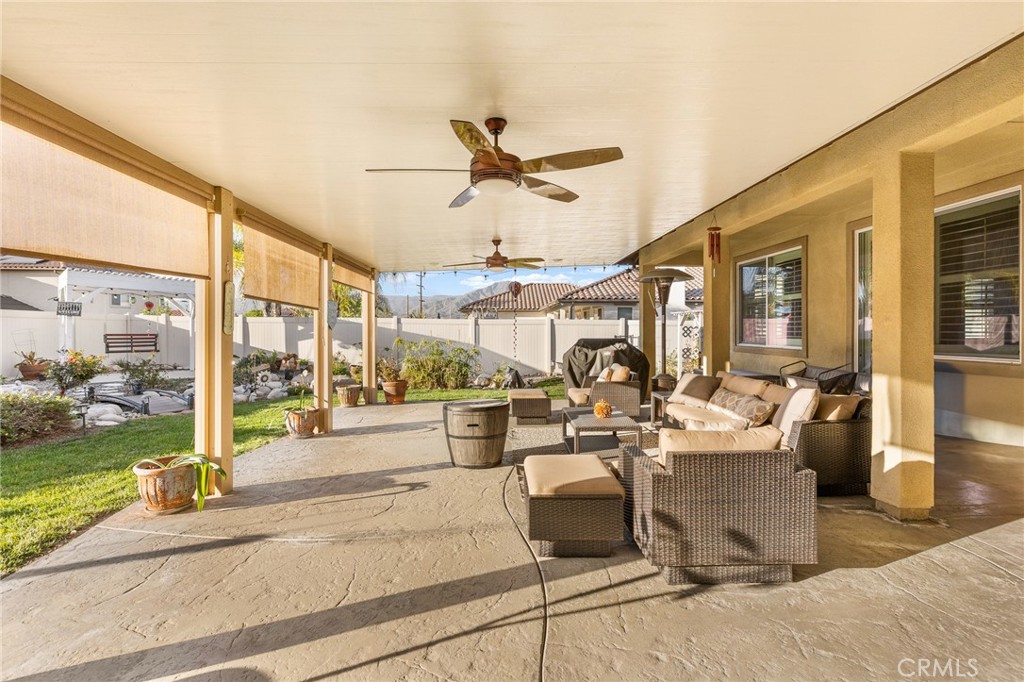 1575 North Grove Street Redlands, CA 92374 - Photo 33 of 45 a very nice looking living room with a large window and chandelier