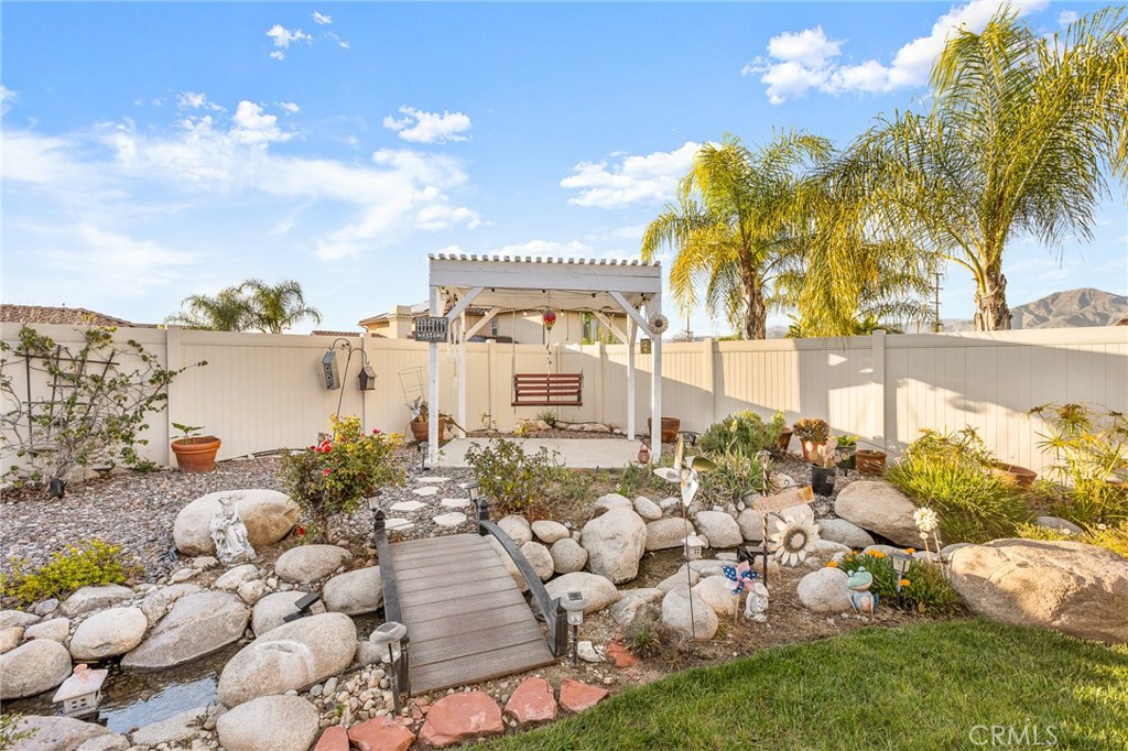 1575 North Grove Street Redlands, CA 92374 - Photo 35 of 45 a view of a yard and lake view