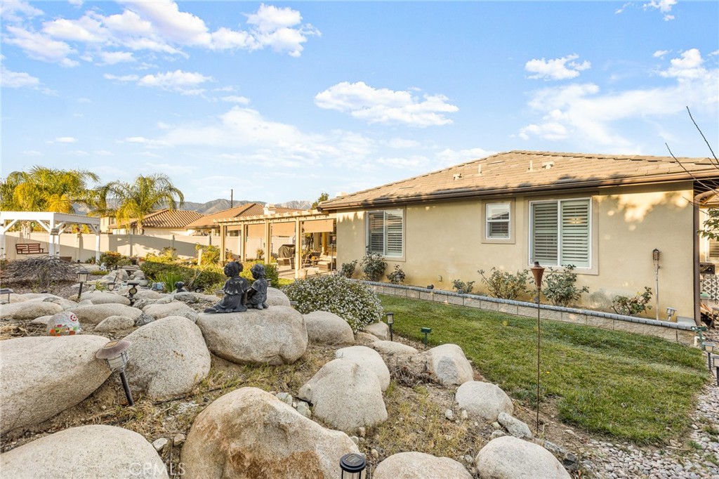 1575 North Grove Street Redlands, CA 92374 - Photo 36 of 45 a backyard of a house with table and chairs