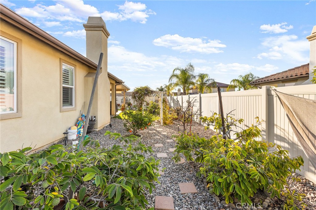 1575 North Grove Street Redlands, CA 92374 - Photo 40 of 45 a front view of a house with a yard and lake view