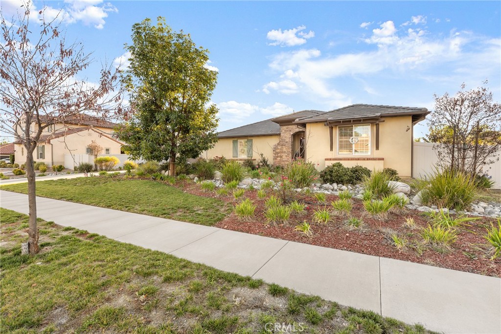 1575 North Grove Street Redlands, CA 92374 - Photo 42 of 45 a front view of a house with garden