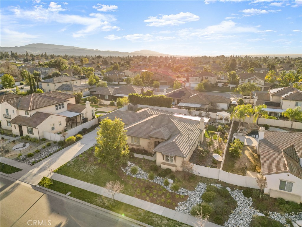 1575 North Grove Street Redlands, CA 92374 - Photo 5 of 45 an aerial view of residential houses with outdoor space