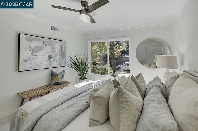 a bedroom with a bed and a shower