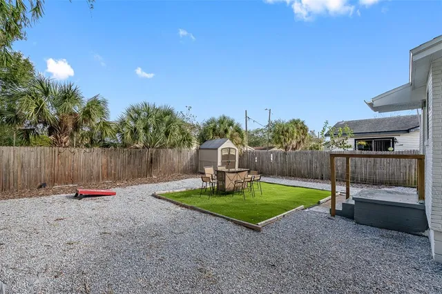 a view of a backyard with a slide