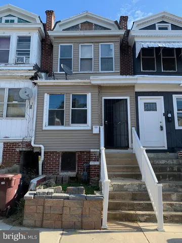 a front view of a house with entertaining space