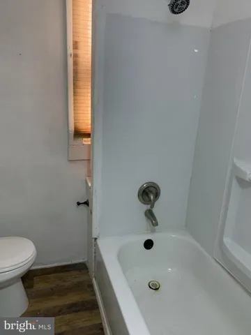 a bathroom with a sink and a bathtub