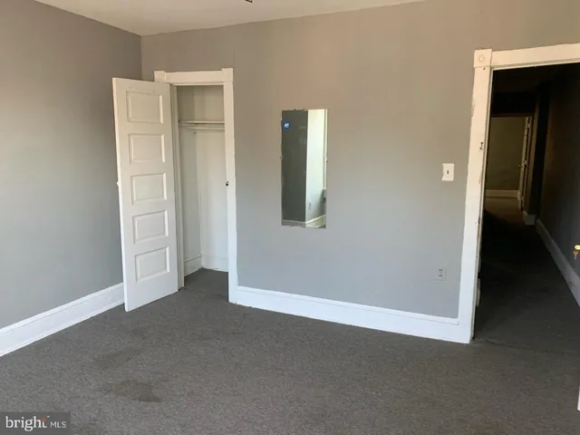 an empty room with closet