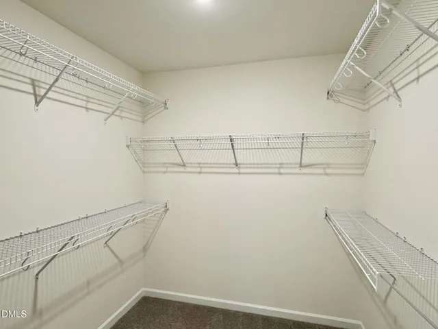 a en suite bathroom with a sink a mirror and a shower