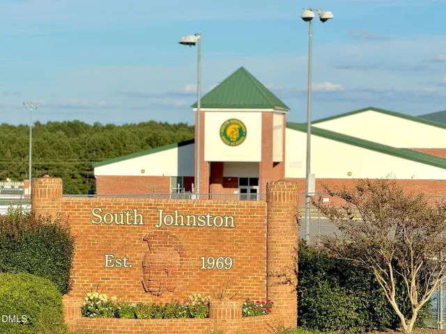 a view of a swimming pool with an ocean view