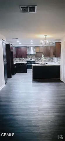 a view of kitchen and microwave