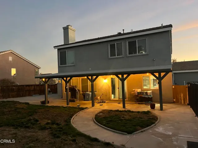 a house view with a swimming pool