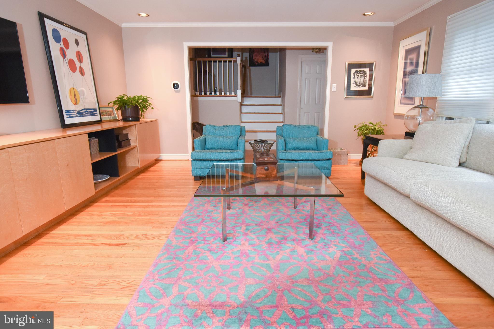 1227 Pinewood Road Villanova, PA 19085 - Photo 16 of 43 a living room with furniture and a flat screen tv