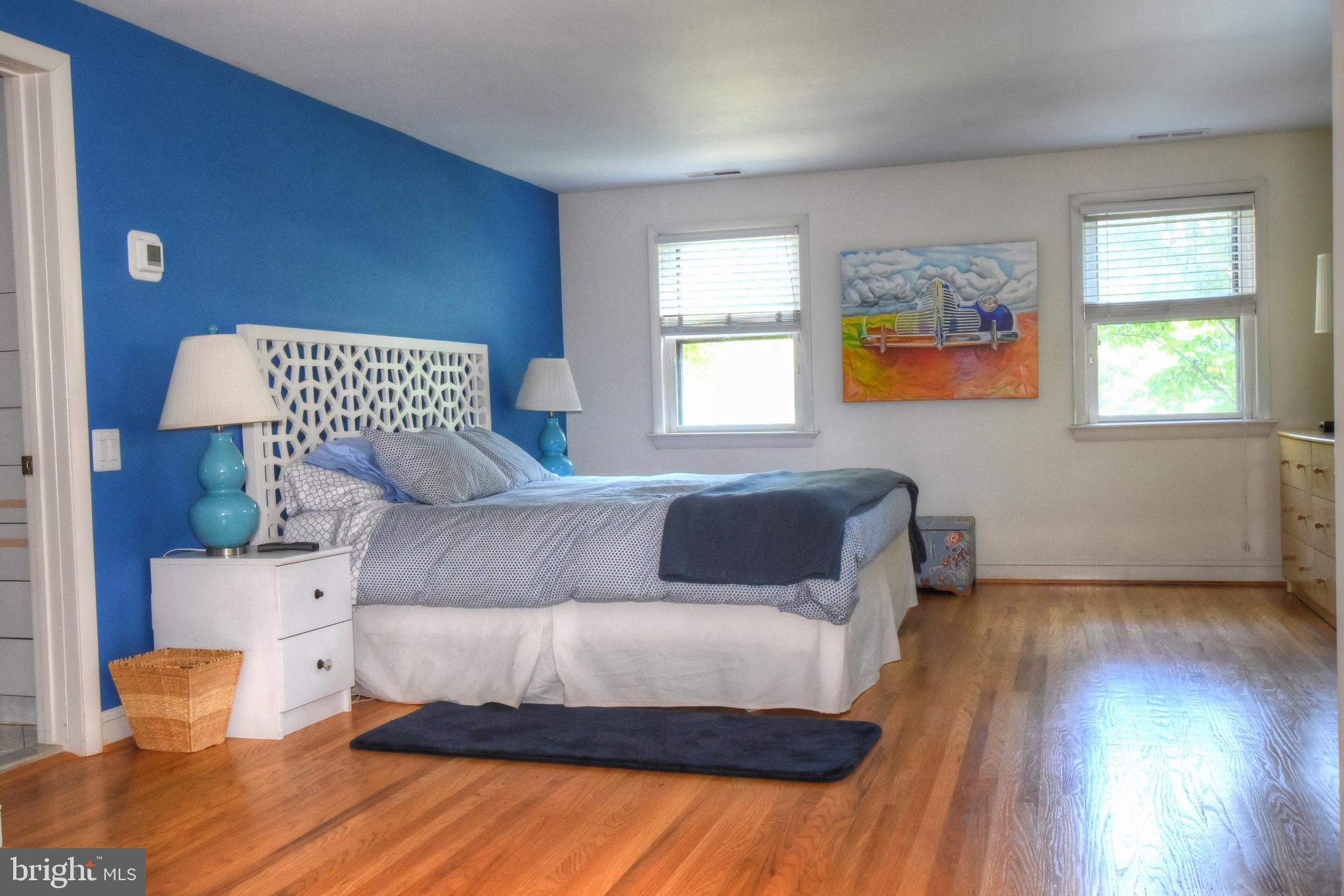 1227 Pinewood Road Villanova, PA 19085 - Photo 18 of 43 a living room with a bed and a window