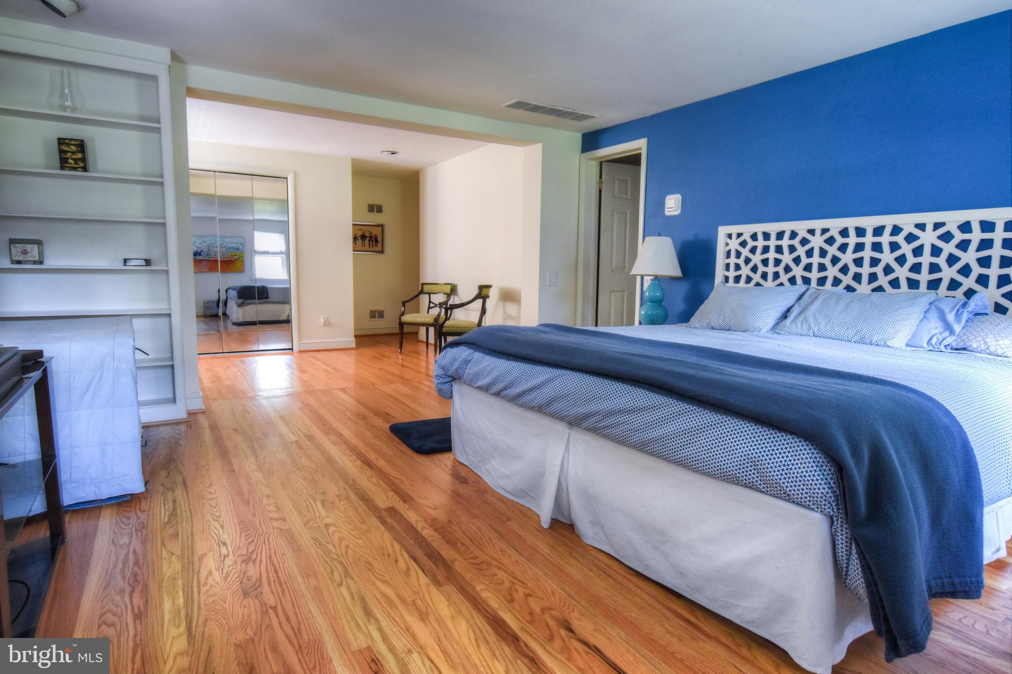 1227 Pinewood Road Villanova, PA 19085 - Photo 19 of 43 a spacious bedroom with a bed and wooden floor