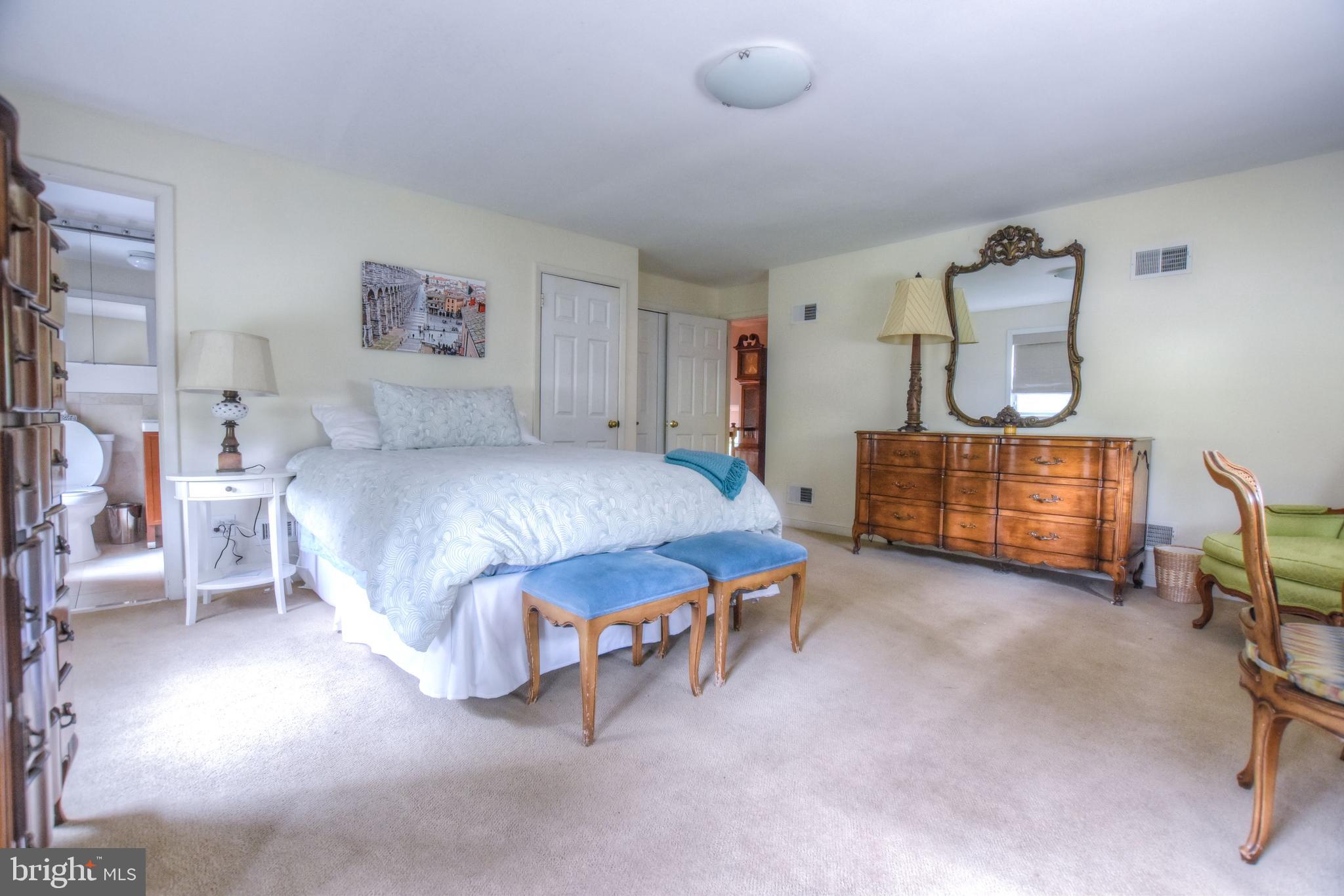 1227 Pinewood Road Villanova, PA 19085 - Photo 23 of 43 a bedroom with a bed and a cabinets