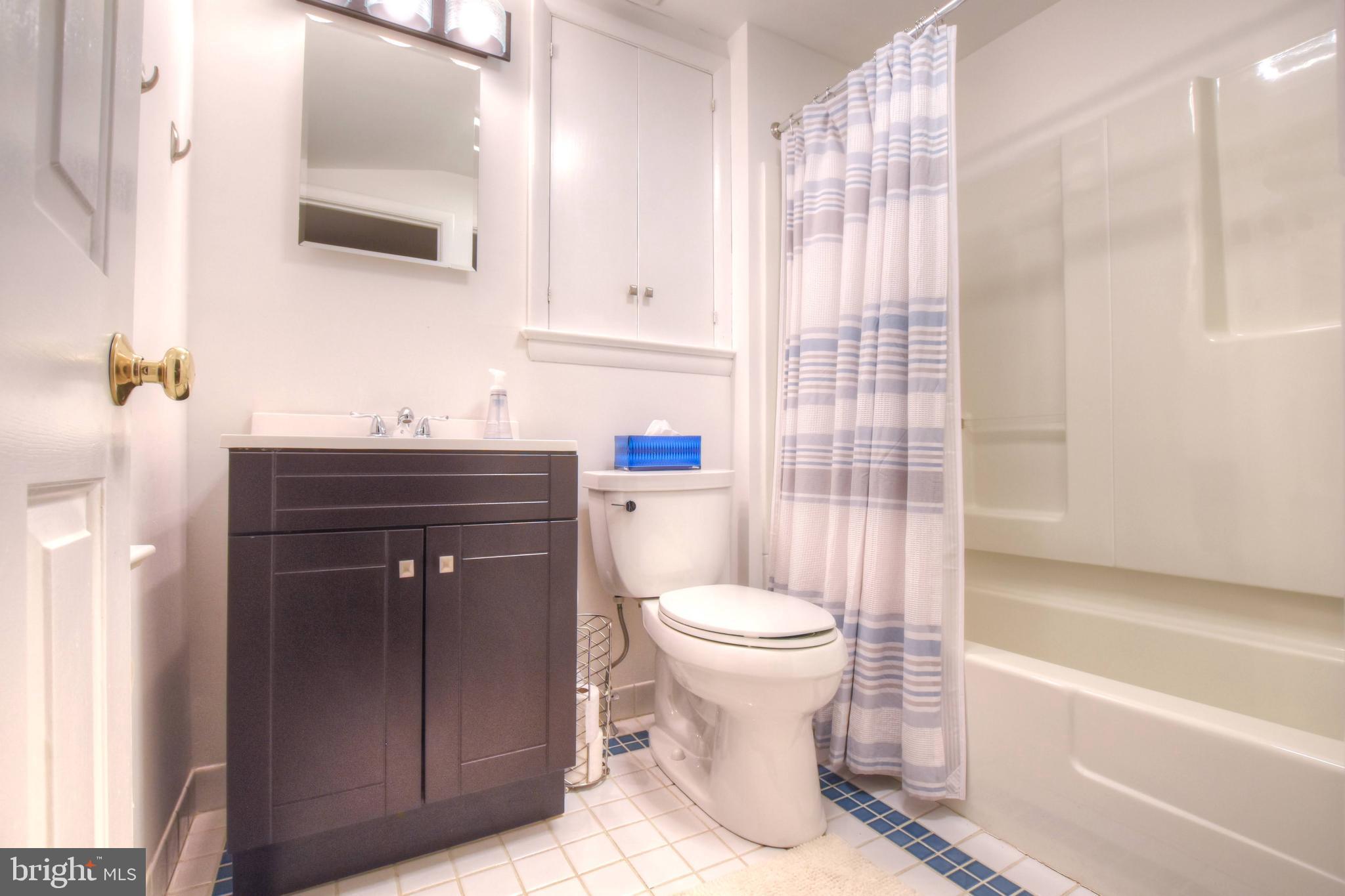 1227 Pinewood Road Villanova, PA 19085 - Photo 28 of 43 a bathroom with a sink toilet and shower