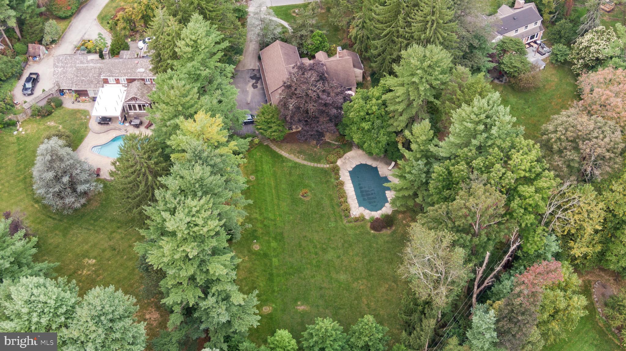 1227 Pinewood Road Villanova, PA 19085 - Photo 38 of 43 an aerial view of house with yard swimming pool and outdoor seating
