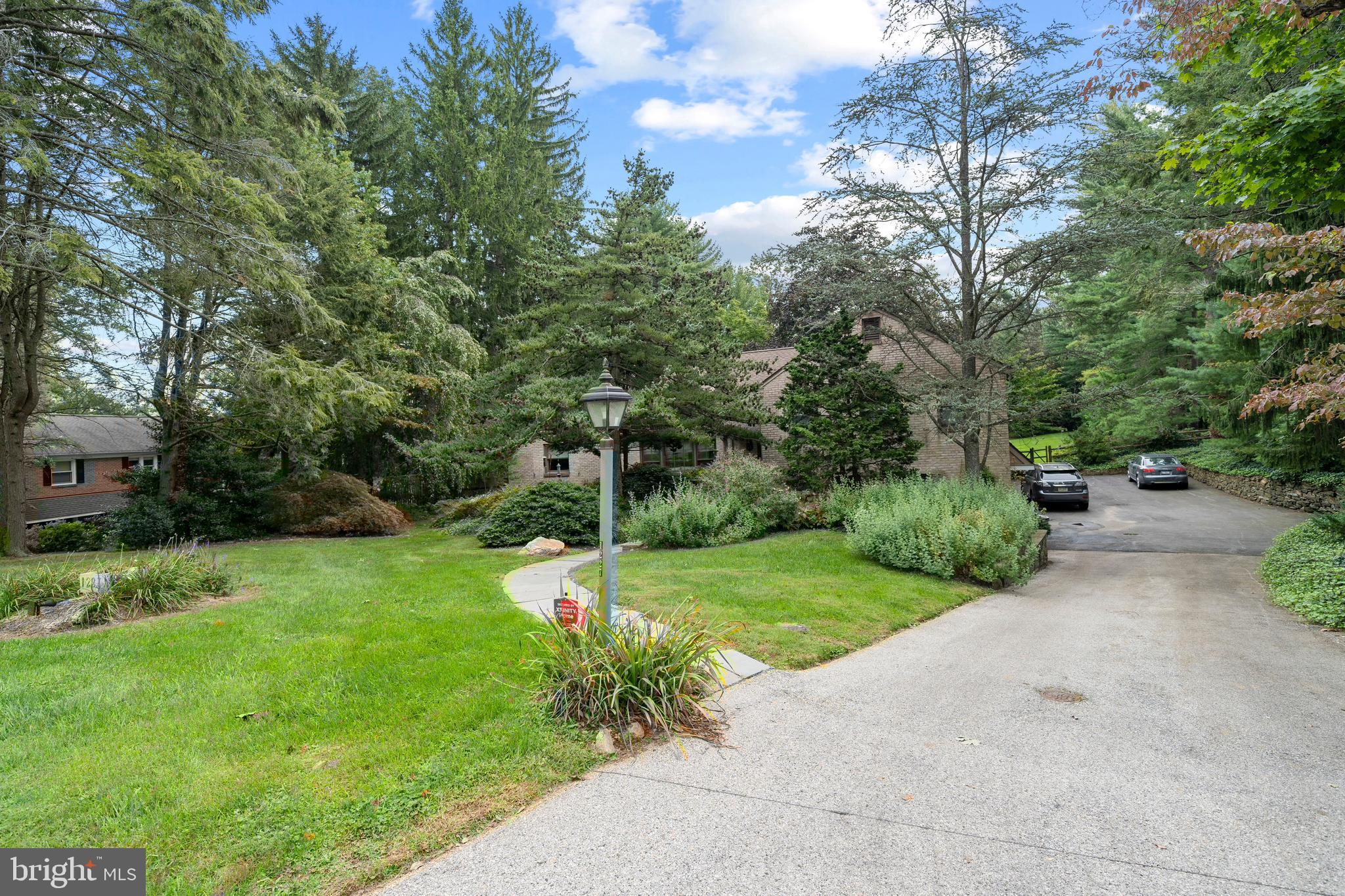 1227 Pinewood Road Villanova, PA 19085 - Photo 5 of 43 a view of a park with plants and trees