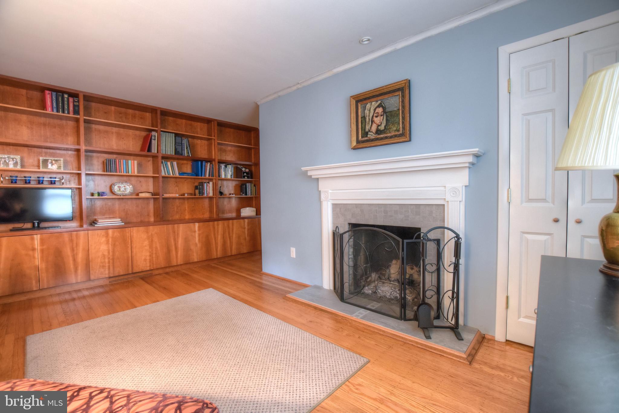 1227 Pinewood Road Villanova, PA 19085 - Photo 7 of 43 a view of a livingroom with an empty space and a fireplace