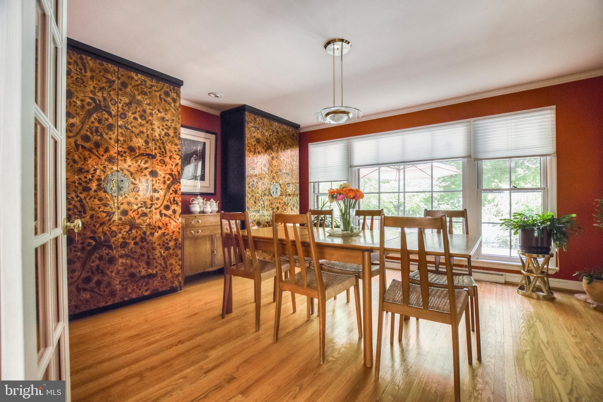 1227 Pinewood Road Villanova, PA 19085 - Photo 10 of 43 a view of a dining room with furniture water view and wooden floor