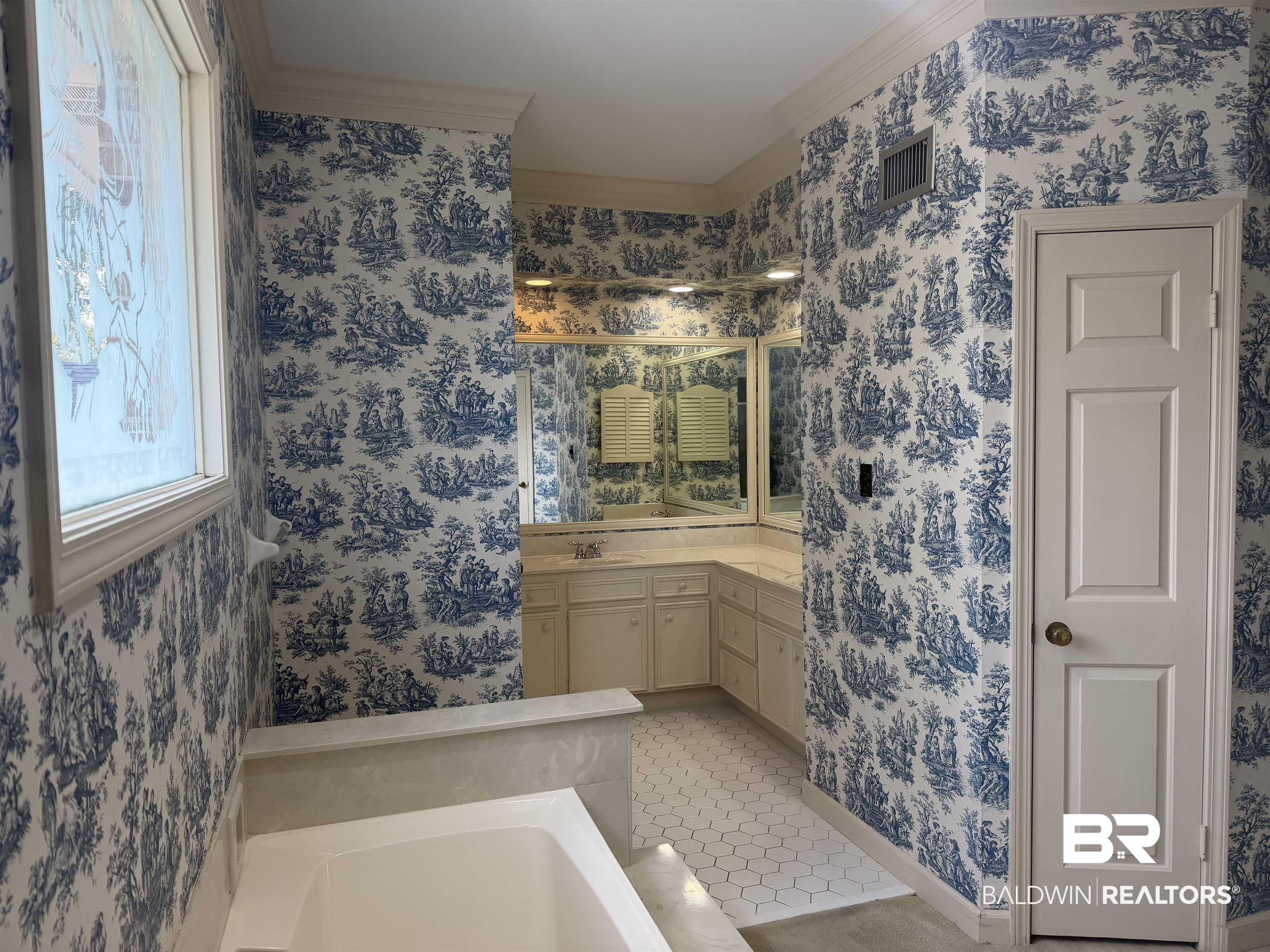 53 Warwick Road Mobile, AL 36608 - Photo 41 of 45 Bathroom with wallpapered walls, vanity, a bath, and crown molding