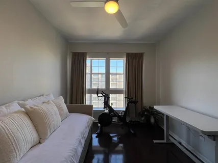 a living room with furniture and a window