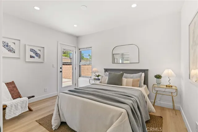 a bedroom with a bed and furniture