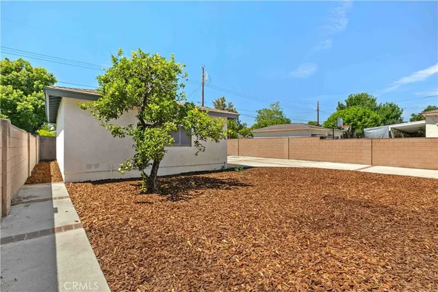 a view of a house with a street